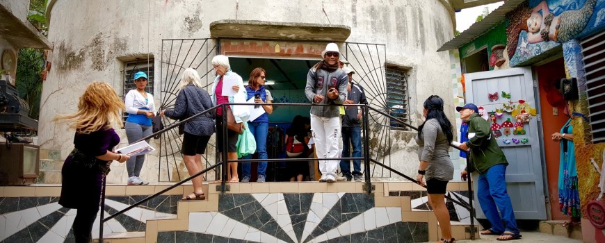 Artists and visitors mingle at the art center.