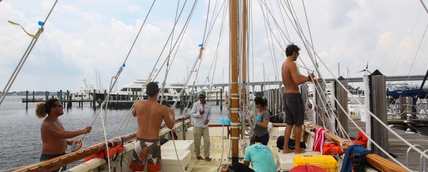 Preparing to drop both masts in order to travel under upcoming bridges